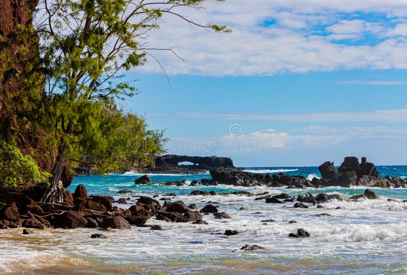 The Lehoula Sea Arch at Koki Beach Stock Photo - Image of islands ...