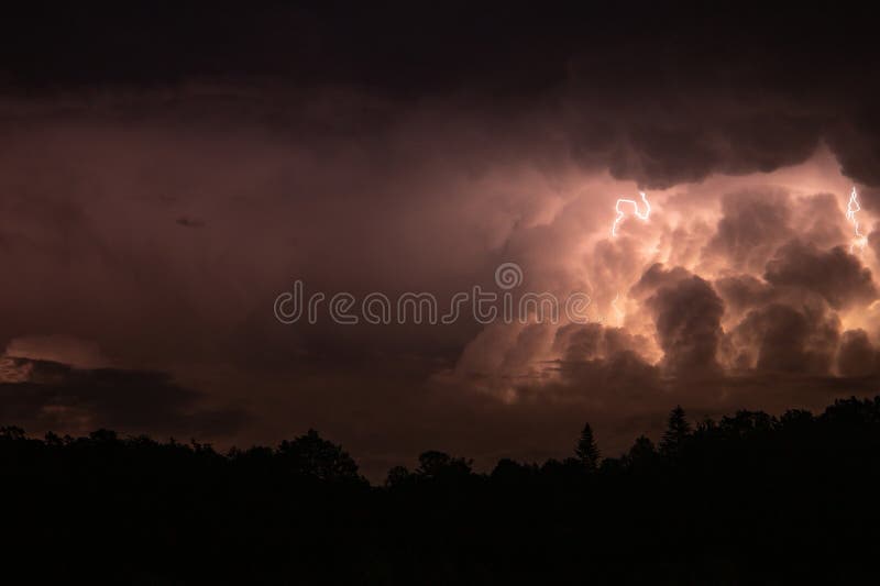 Lightning in the Sky during a Storm at Night Stock Photo - Image of ...