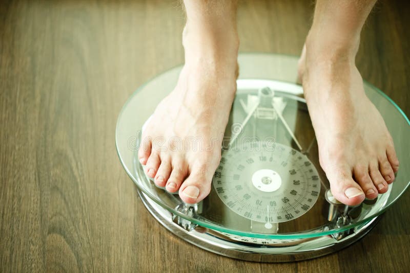 Male on Standing on Glass Floor Weight Scales, Close Up Stock Photo ...