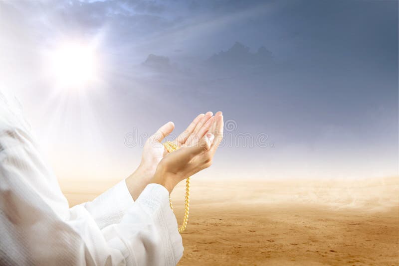 Muslim Man Praying with Prayer Beads on His Hands in Desert Stock Image -  Image of dark, hope: 146773829