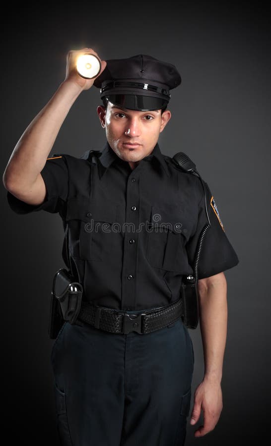 Policeman or Security Guard Shining a Torch Stock Image - Image of ...