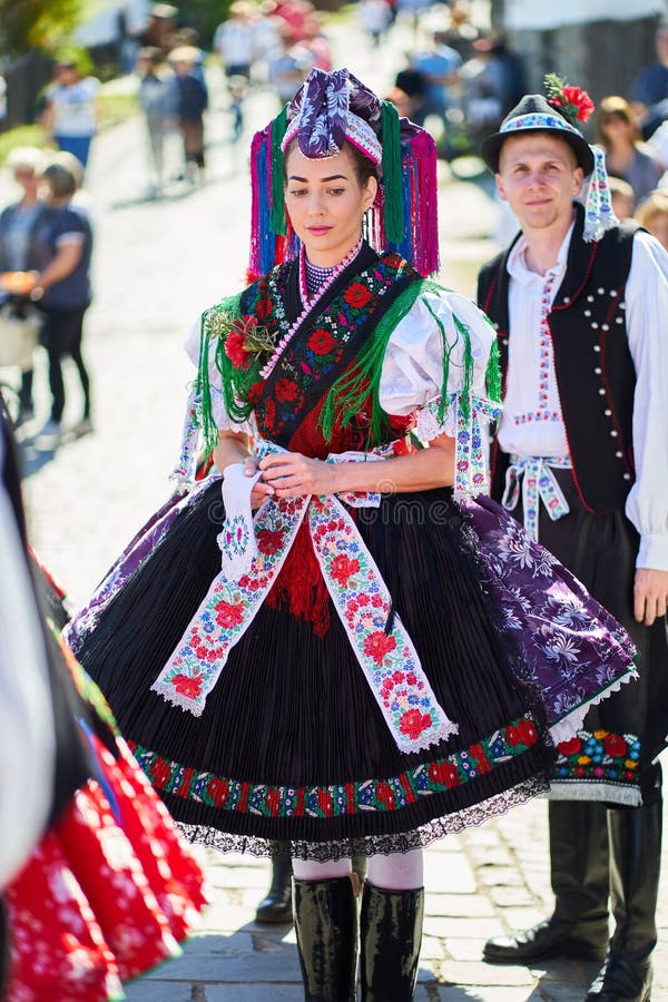 Portrait of a Young Woman Dressed in a Traditional Folk Costume in Holloko  Village, Hungary Editorial Stock Photo - Image of christian, architecture:  176280693