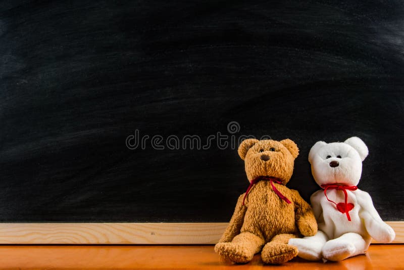 Teddy bear with blackboard , background stock photo