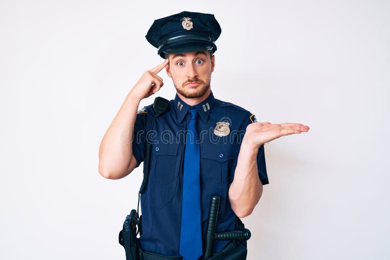 Young Caucasian Man Wearing Police Uniform Confused and Annoyed with ...