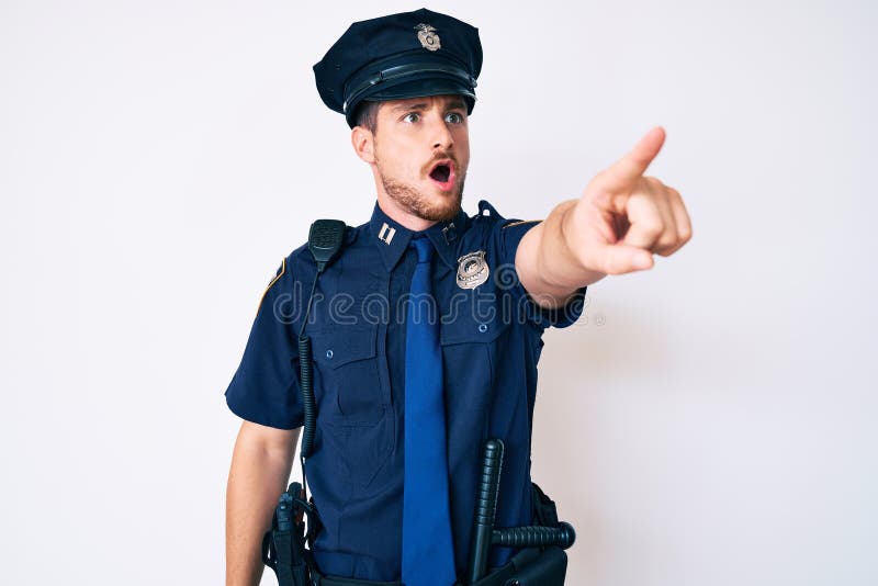 Young Caucasian Man Wearing Police Uniform Pointing with Finger ...