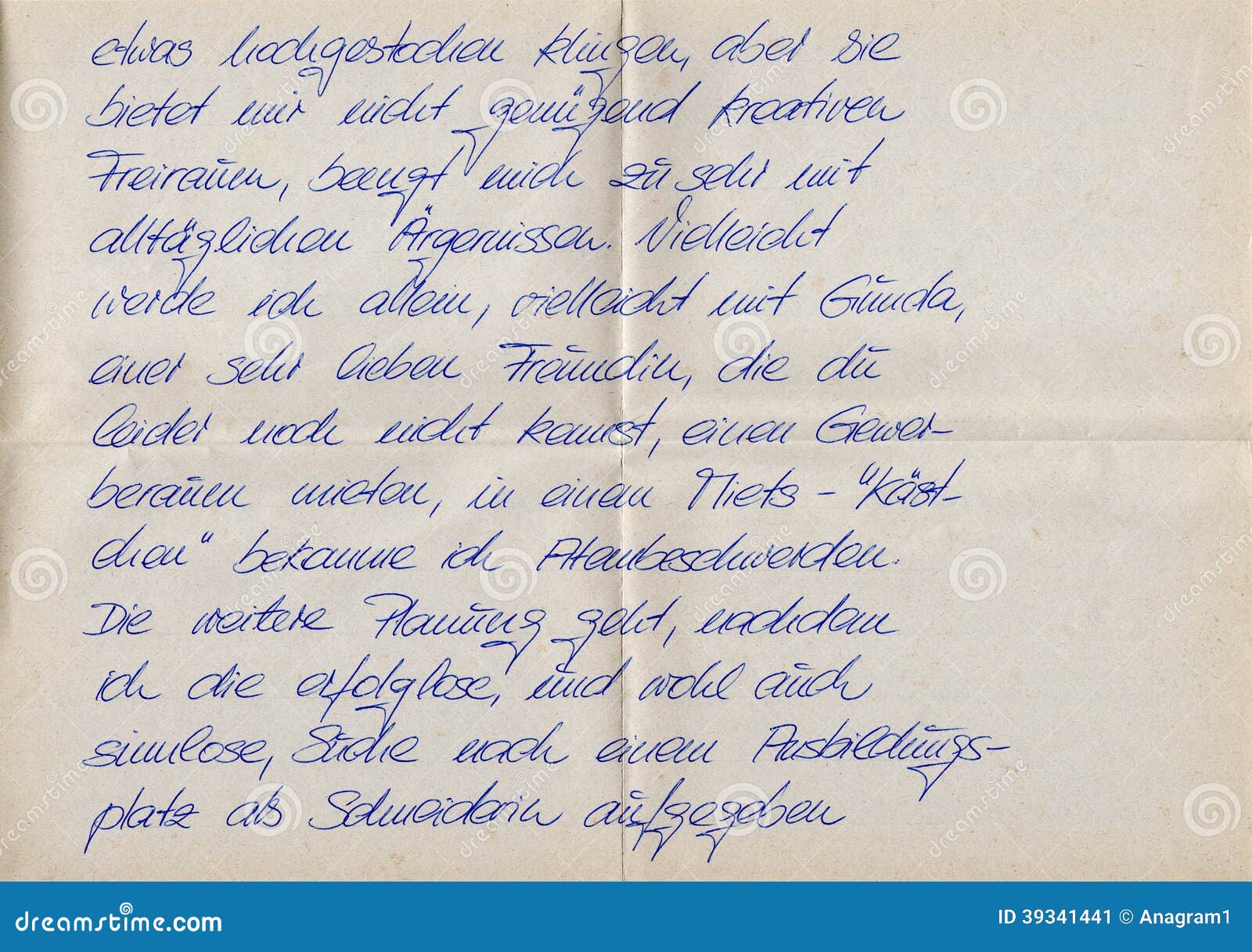 Closeup of an old letter written with blue ink.