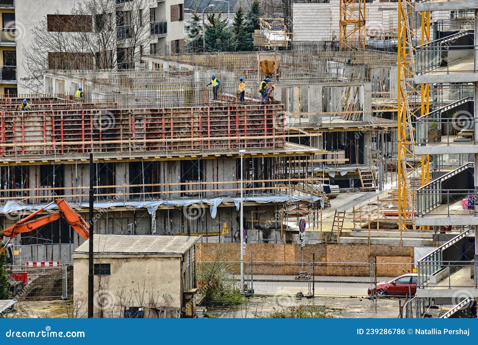 Construction Workers Install Formwork And Iron Rebars Or Reinforcing ...