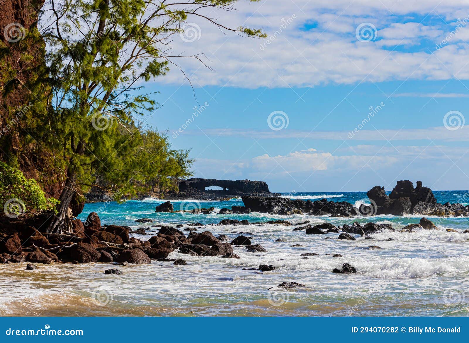 The Lehoula Sea Arch at Koki Beach Stock Photo - Image of islands ...