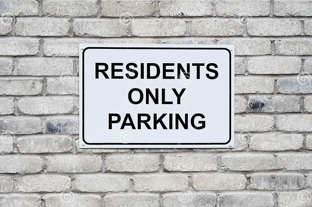 Residents only Parking Sign on Wall at Private Housing Development ...