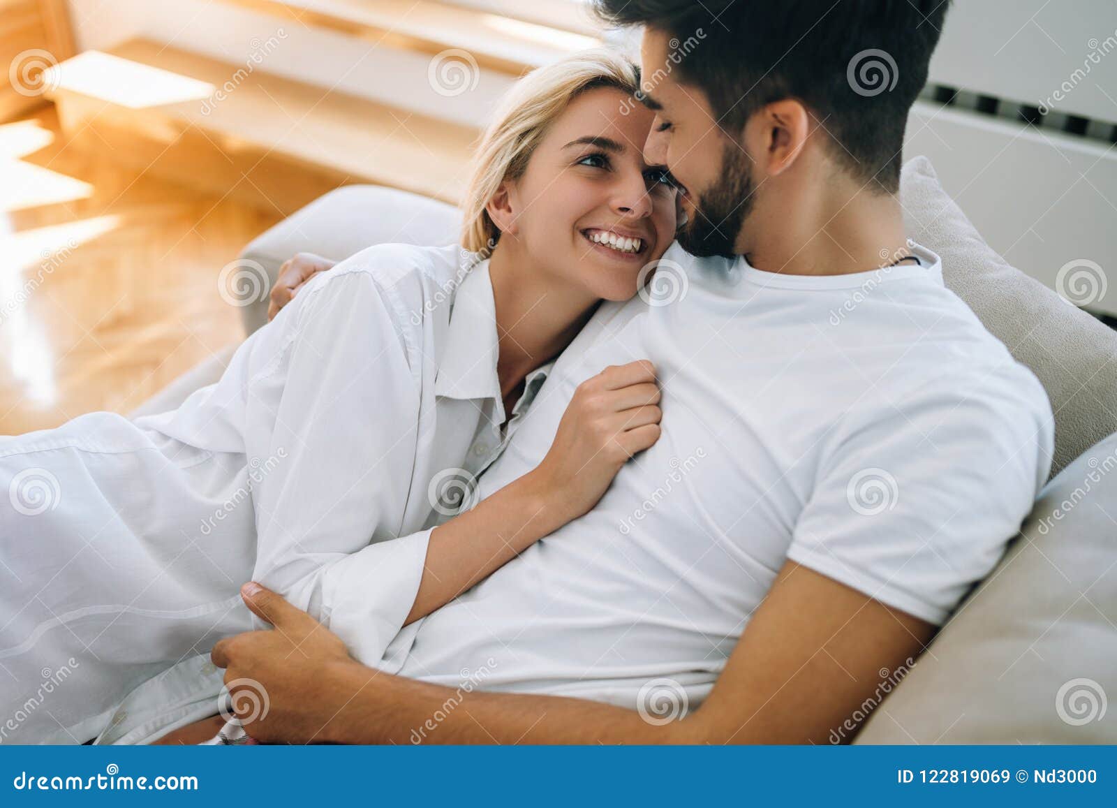 Romantic couple in bed stock image. Image of beautiful - 122819069