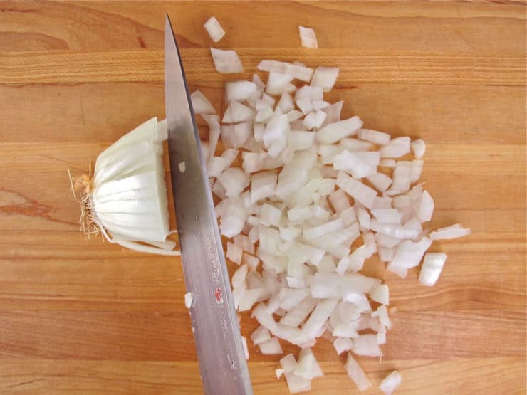 All About Onions: History, Chopping and Stopping Tears - Learn a little history about the onion, how to get rid of the onion smell and tears, and how to properly chop and mince one using a chef's knife.