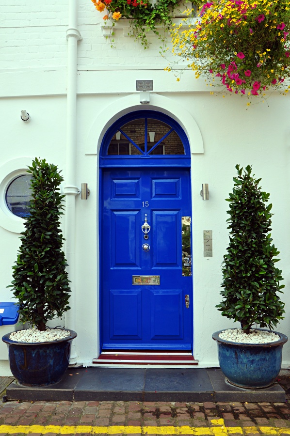 Bright Blue Door with Arched Transom Window