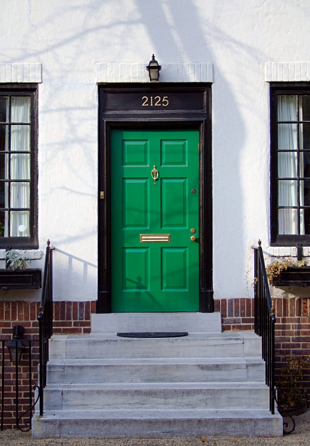 Green front door and steps.  Philadelphia, PA.