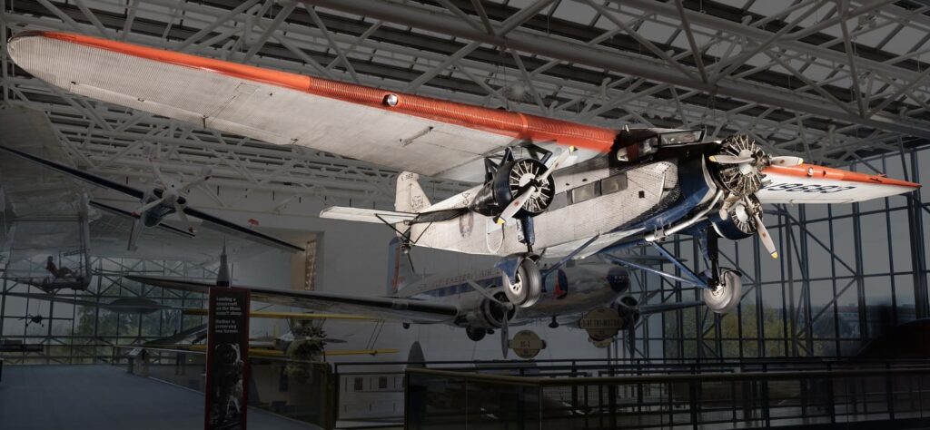 Smithsonian National Air and Space Museum - Ford 5-AT Tri-Motor - US History of Tourism, first coast to coast flight: Transcontinental Air Transport (TAT) was an airline founded in 1928 by Clement Melville Keys that merged in 1930 with Western Air Express to form what became TWA. 