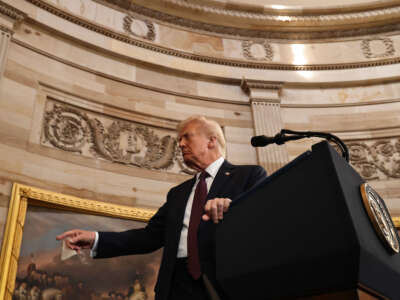 President Donald Trump gestures as he speaks during inauguration ceremonies in the Rotunda of the U.S. Capitol on January 20, 2025, in Washington, D.C.