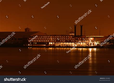 Riverboat On The Mississippi River At Night In New Orleans. Stock Photo ...