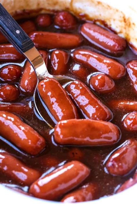 These tiny crock pot hot dogs pack a HUGE flavor! #appetizers # ...