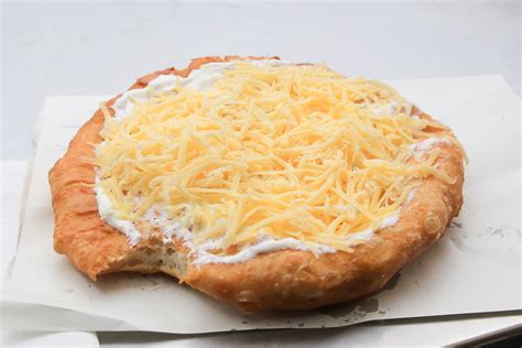 langos sour cream cheese in budapest - Hungary Photo Tours