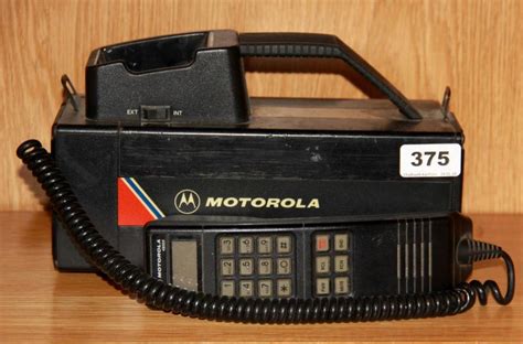 Sold at Auction: An early Motorola 4800X mobile phone, c. 1985, 26 x 19cm.