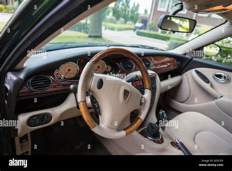 Rover 75 car interior with a walnut dashboard, color green Stock Photo ...