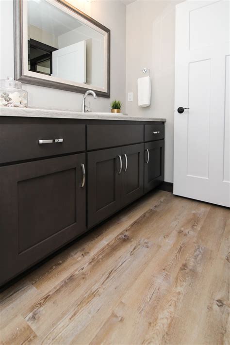 Bathroom with vinyl plank flooring - financesno