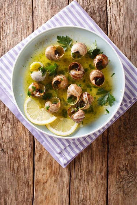 French Cuisine: Escargot with Butter, Herbs and Garlic Close-up Stock ...