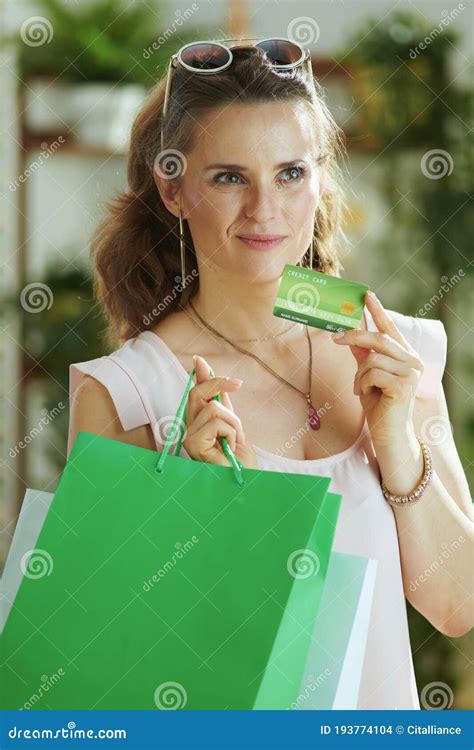 Pensive Trendy Female Shopper in Blouse with Bags Stock Photo - Image ...