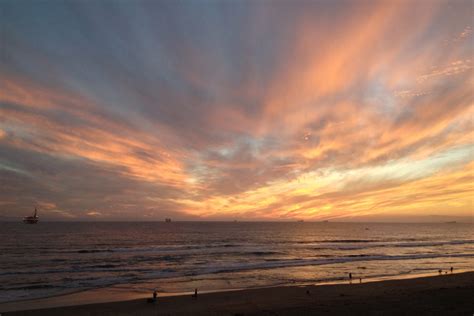 Free Stock Photo of Sunset Clouds in the Sky Over the Ocean