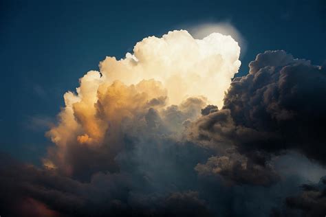 Sun Light Through Thunder Storm Clouds by Juan Silva