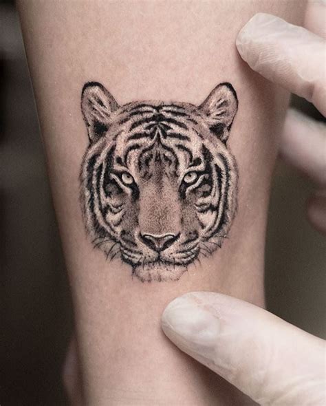 Tiger Face Tattoo On Hip