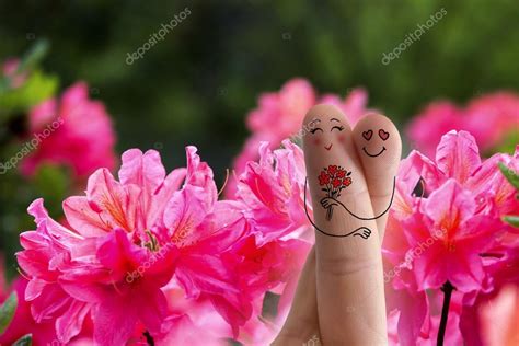 Lovers are embracing and holding bouquet of red flowers — Stock Photo ...