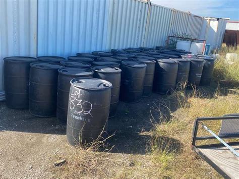 (44) Black Plastic 55 Gallon Drums - ELCO Auctions