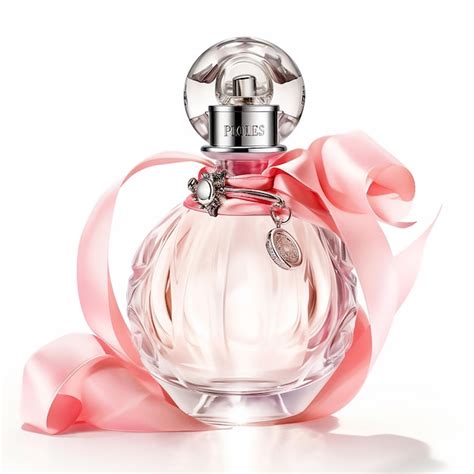 Premium AI Image | A luxury pink perfume bottle on a white