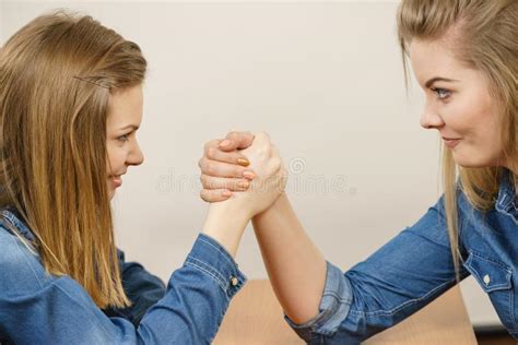 Two Women Having Arm Wrestling Fight Stock Photo - Image of angry ...