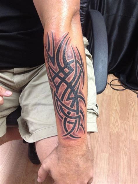 22 Interesting Tribal Forearm Tattoos