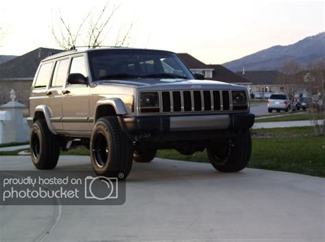 anyone w/ pics of a cherokee w/ headlight covers or smoked headlights ...