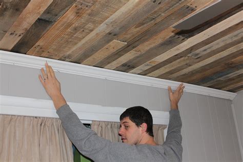 Remodelaholic | Rustic Pallet Wood Ceiling Tutorial