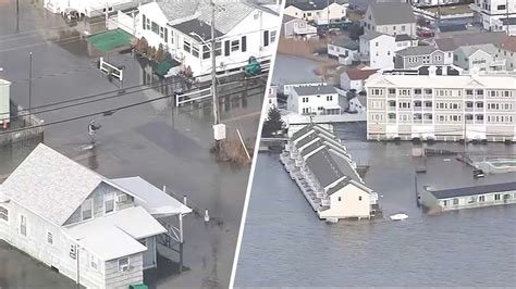 Flood emergency in Hampton Beach, NH, with scores of homes underwater