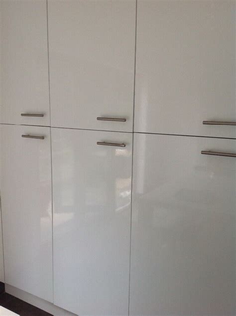 White high gloss kitchen cabinet doors with chrome handles | in West ...