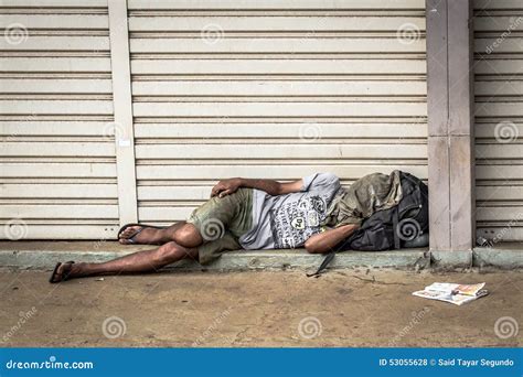 Homeless Person Sleeping stock photo. Image of destitute - 53055628