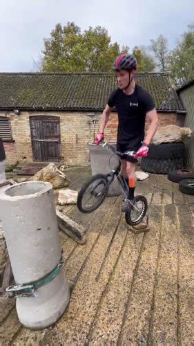 man doing one wheel balance bike tricks