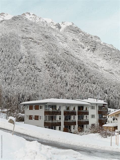 "Snowy Mountains With residential House Below" by Stocksy Contributor ...