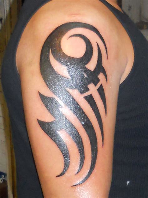 50 Tribal Tattoos For Men - InspirationSeek.com