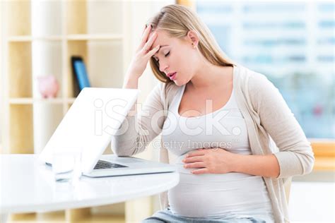 Tired Pregnant Woman Working Stock Photo | Royalty-Free | FreeImages