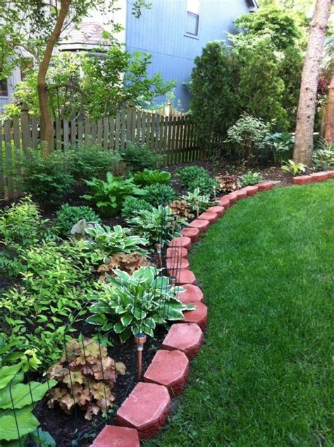 My low maintenance shade garden- shrubs, hostas | Garden shrubs, Shade ...