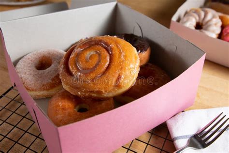 Box of donuts stock image. Image of frosting, pastry - 187192025