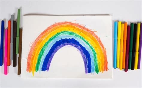 Premium Photo | Drawing of a 6 year old child a rainbow drawn with felttip pens in a sketchbook