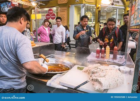 Hawker or Vender Selling Street Food in Dongdaemun Market at Night ...