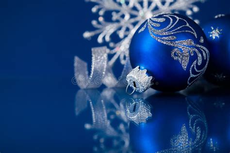 Blue and Silver Christmas Ornaments on Dark Blue Background Stock Photo ...