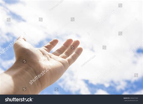 Man Hand Reaching Out Towards Sky Stock Photo 205621564 | Shutterstock